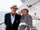 Patricia Routledge and Clive Swift board the QE2