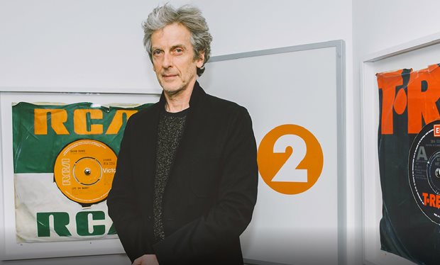 Peter Capaldi opens the TARDIS door to make way for 13th Doctor