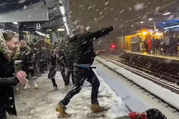 Waiting on the Tube, a snowball fight breaks out in London’s Underground